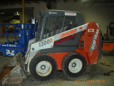 1300c trak international skid steer loaders|scat 1300d wheel loader specs.